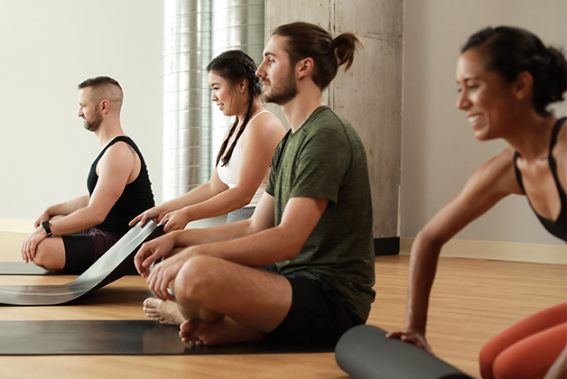 What Is CorePower Yoga? (& How To Sign Up For A Class)